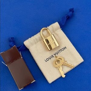 Louis Vuitton Lock and Key set NEW w/ dust bag